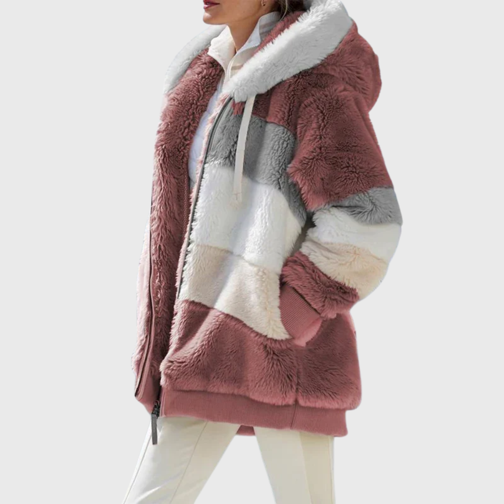 Chaqueta rosa oscuro con franjas claras, capucha amplia y bolsillo lateral, vista de perfil.