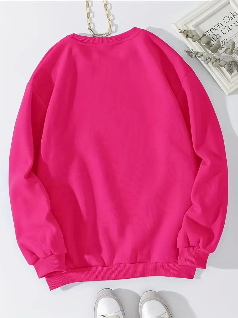 Vista trasera de una sudadera fucsia de cuello redondo, con mangas largas, puños y bajo de canalé, sin estampado visible.