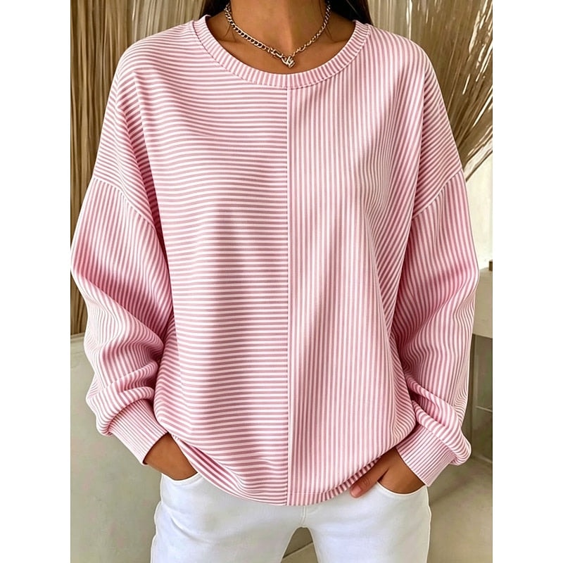 Sudadera holgada de rayas en tonos rosas, mostrada de frente con cuello redondo, mangas amplias y puños ajustados.