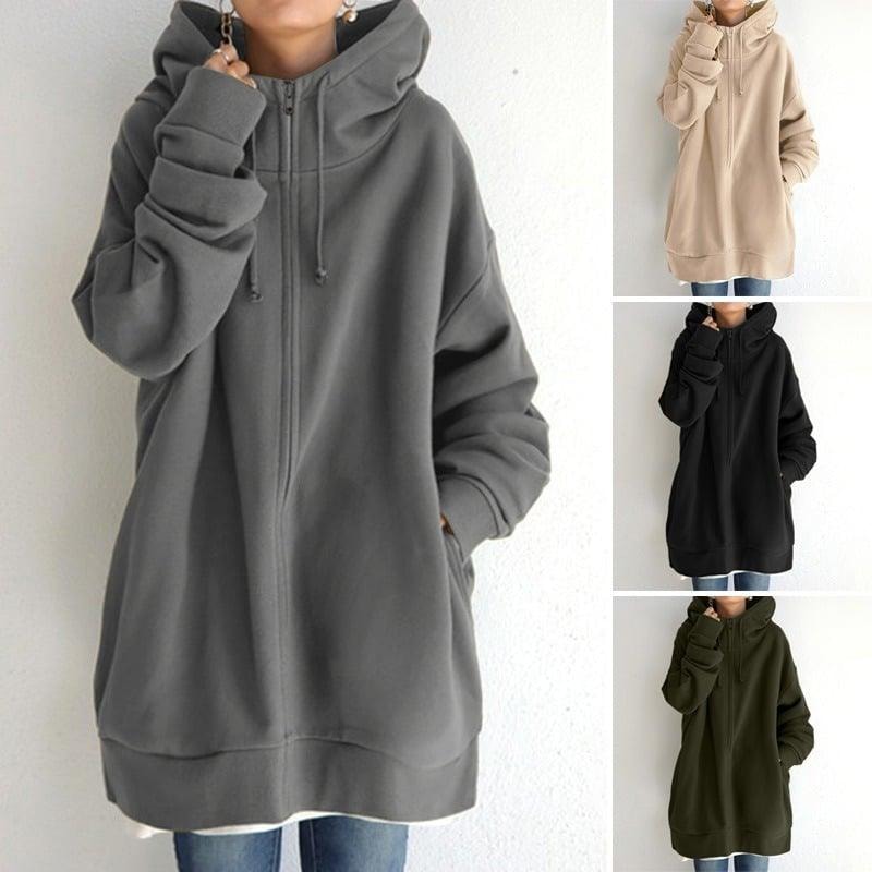 Composición de la sudadera gris oversize junto a opciones de color beige, negro y verde oscuro.